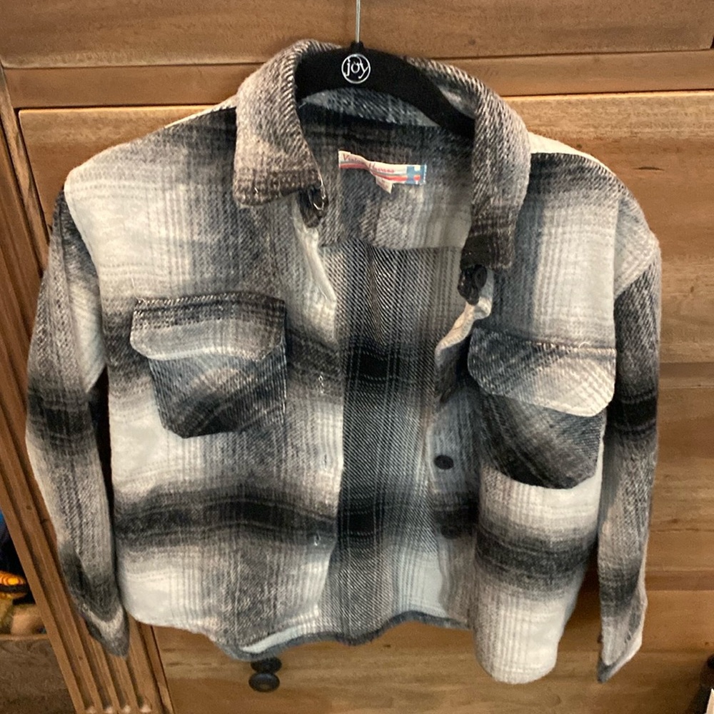 Fuzzy cotton warm flannel.  Cute to layer